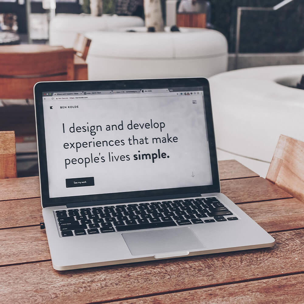 Laptop on desk with open website