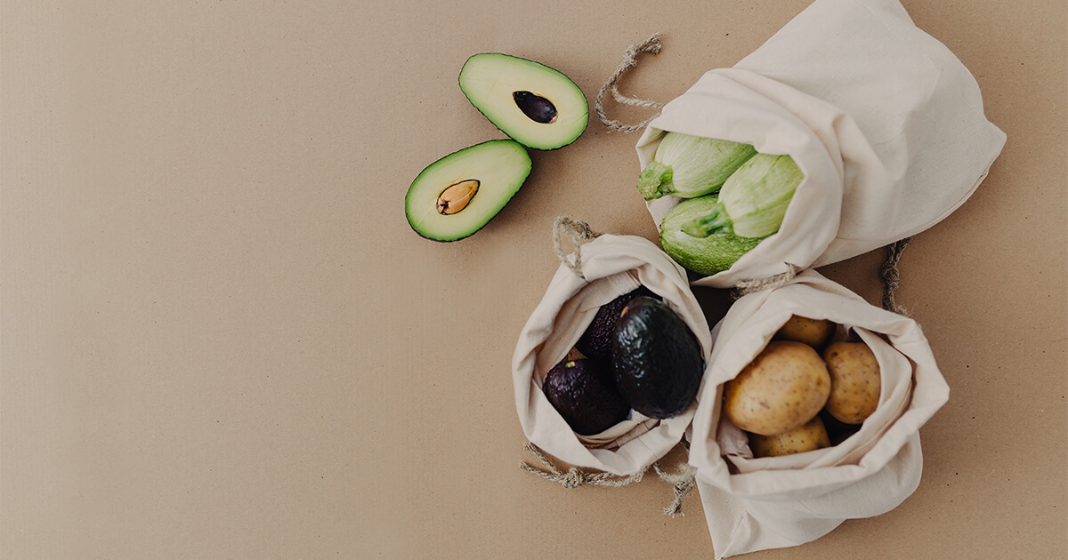 Various vegetables in reusable bags